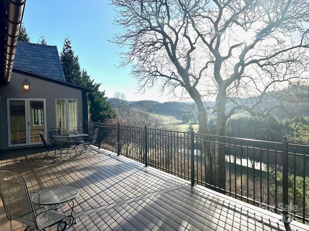 520 East Landing Ridge Circle Jefferson, NC 28640 - Photo 44 of 48 a view of a house with a wooden fence