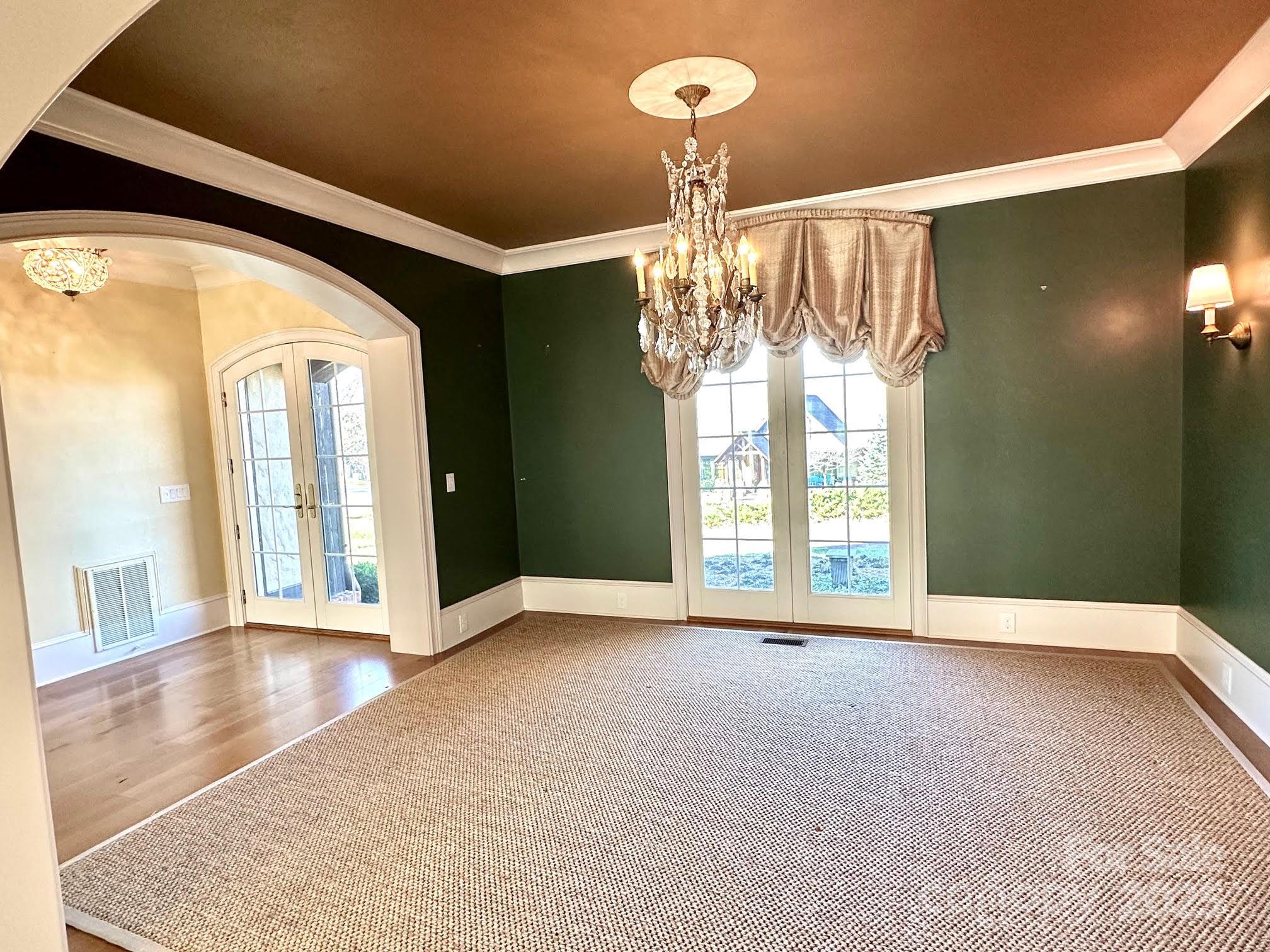 520 East Landing Ridge Circle Jefferson, NC 28640 - Photo 7 of 48 a view of an empty room with a chandelier