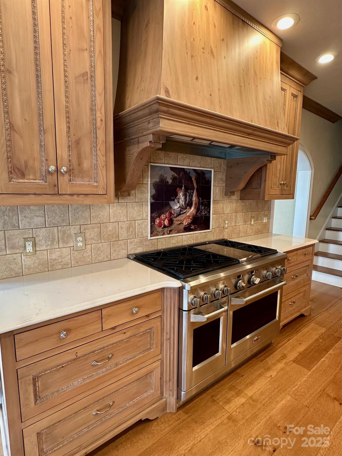 520 East Landing Ridge Circle Jefferson, NC 28640 - Photo 10 of 48 a stove top oven sitting inside of a kitchen