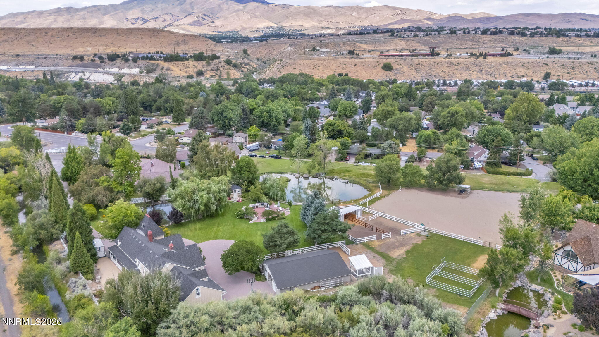 4010 Canyon Drive Reno, NV 89519 - Photo 137 of 147 an aerial view of a city with lots of residential buildings