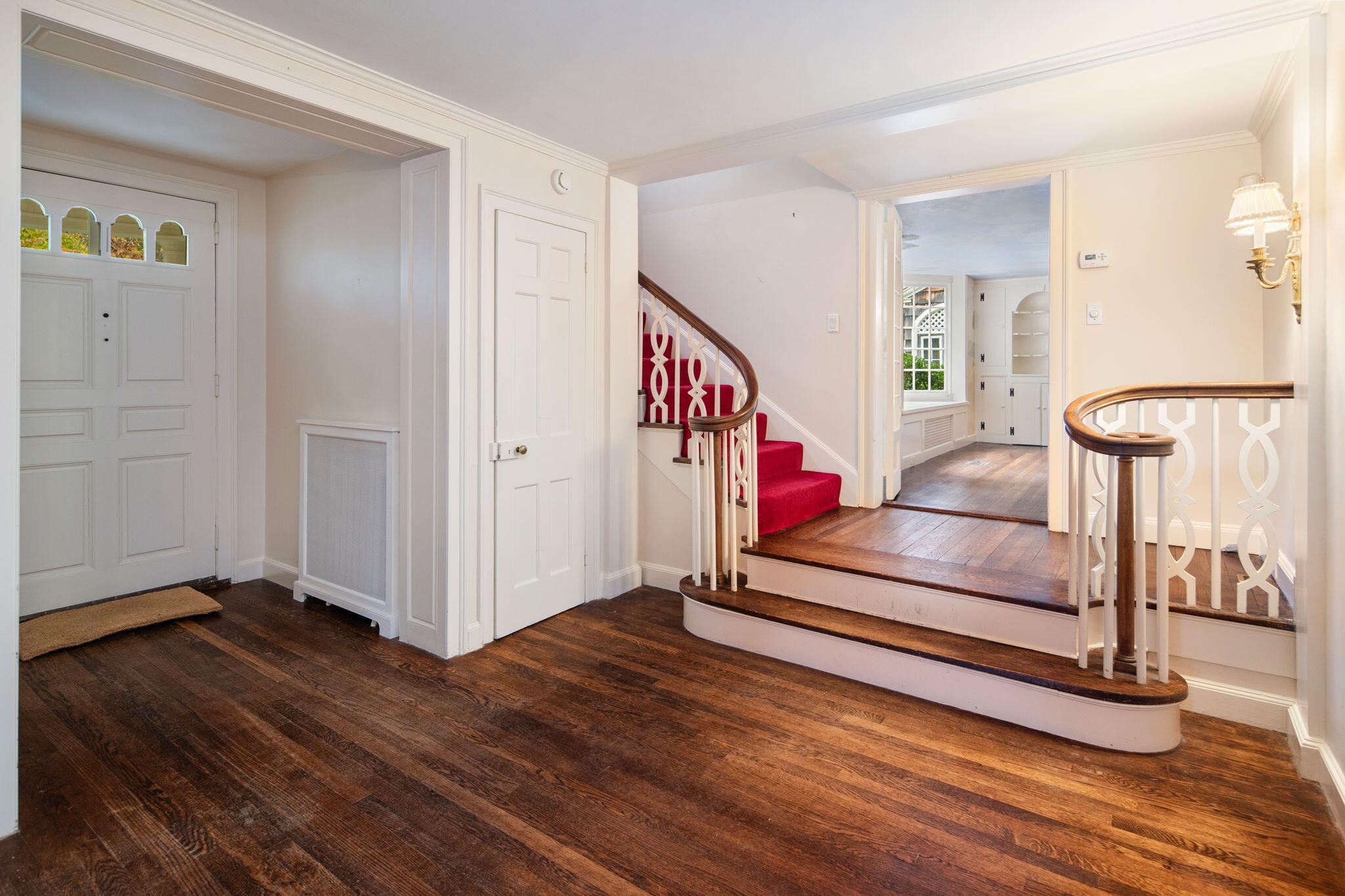 301 Michigan Road New Canaan, CT 06840 - Photo 17 of 46 a view of a room with wooden floor and stairs