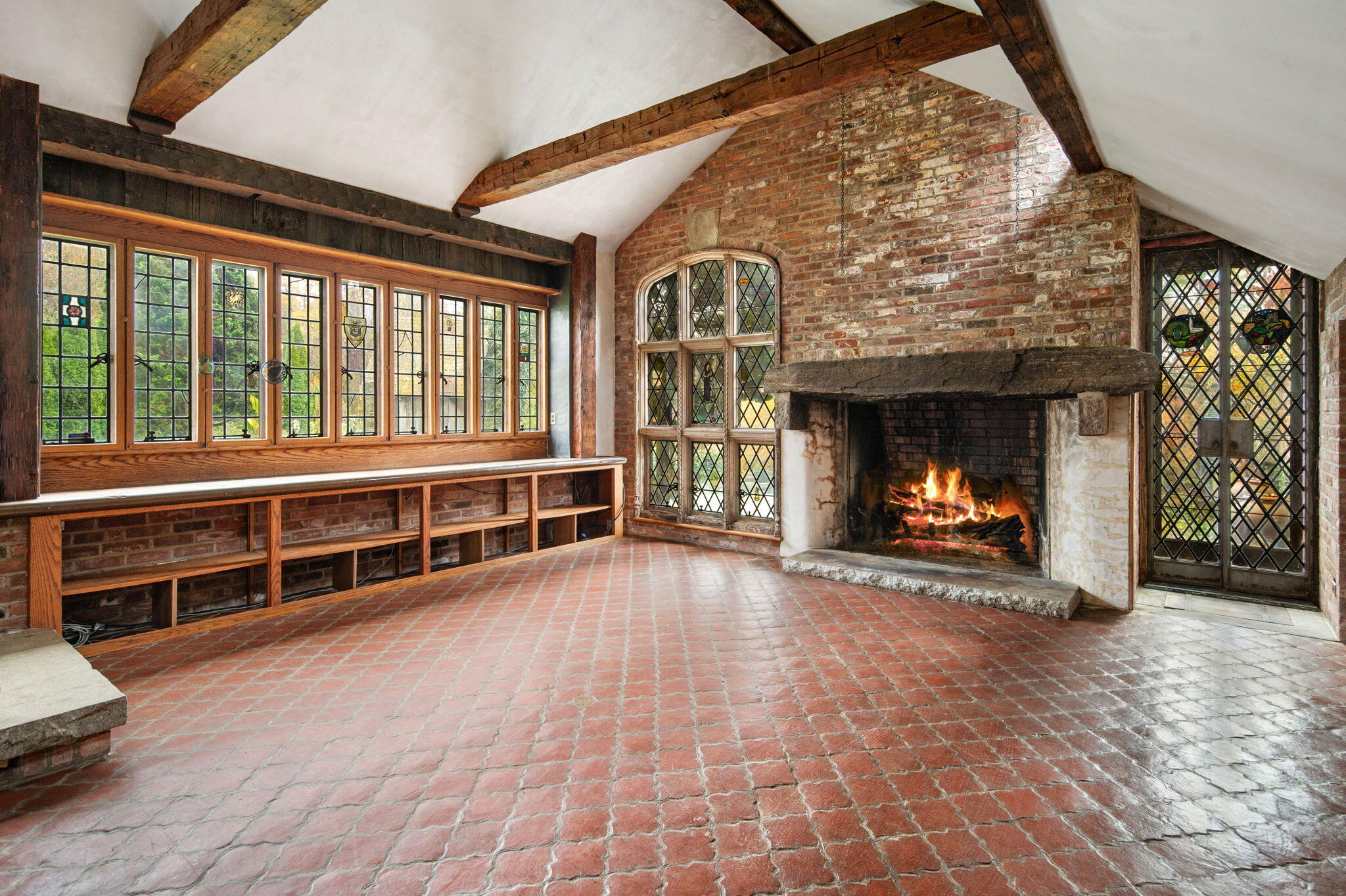 301 Michigan Road New Canaan, CT 06840 - Photo 20 of 46 a view of an empty room with furniture and a fireplace