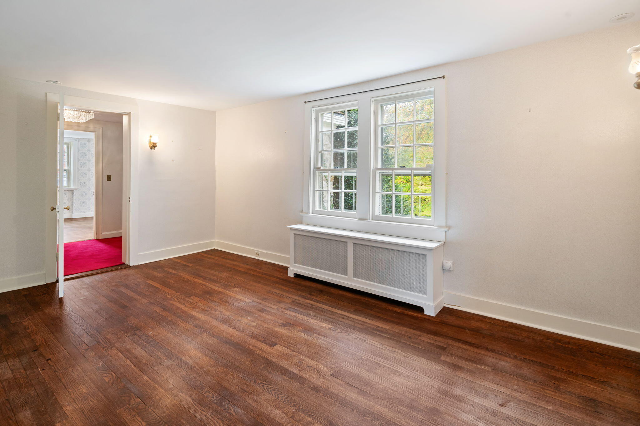 301 Michigan Road New Canaan, CT 06840 - Photo 31 of 46 an empty room with wooden floor and windows