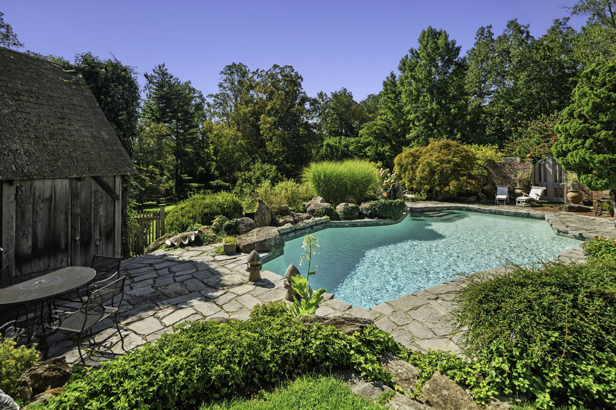 301 Michigan Road New Canaan, CT 06840 - Photo 8 of 46 a view of a park with large trees