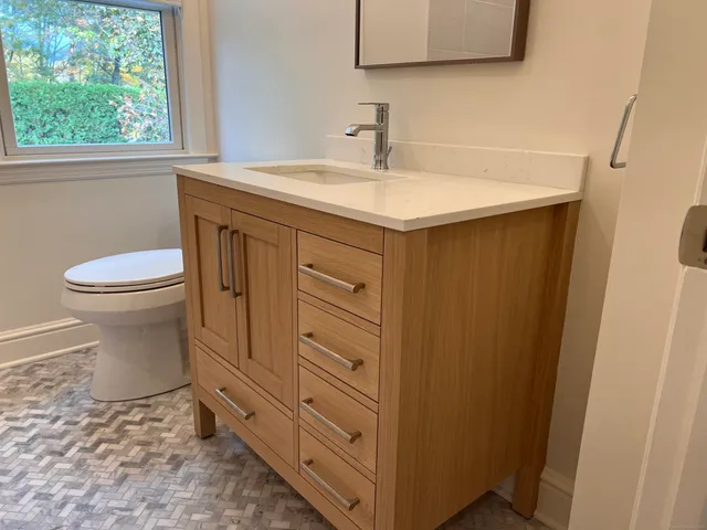 a white bath tub and shower