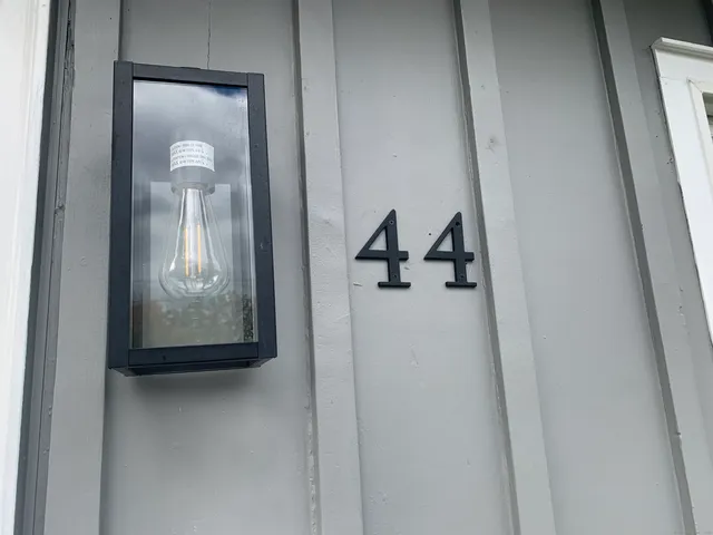a house view with a garden space