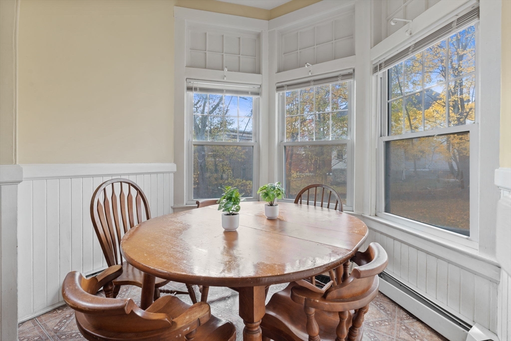 5 Claremont Street Worcester, MA 01610 - Photo 14 of 42 a view of a dining room with furniture window and outside view