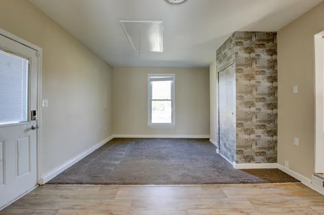 an empty room with windows