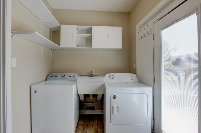 a utility room with dryer and washer
