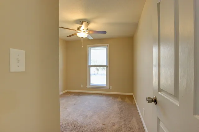 a view of a livingroom with a window