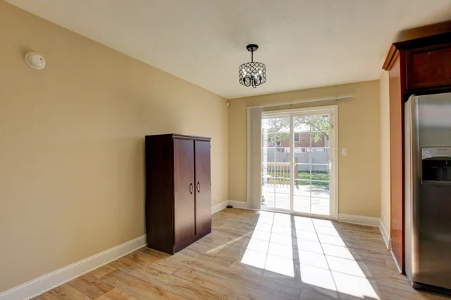 a view of entryway with wooden floor