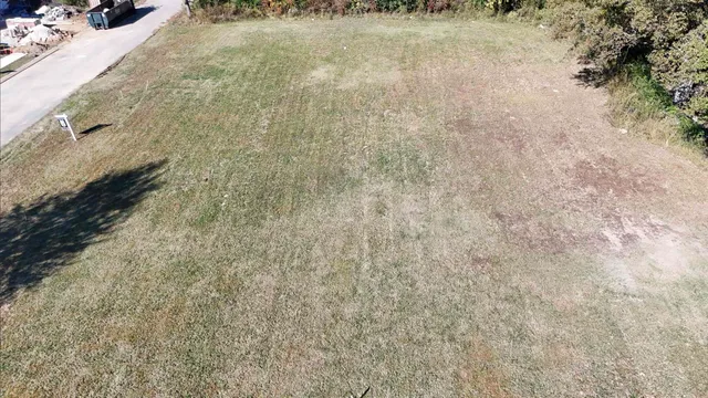 a view of a backyard of a house
