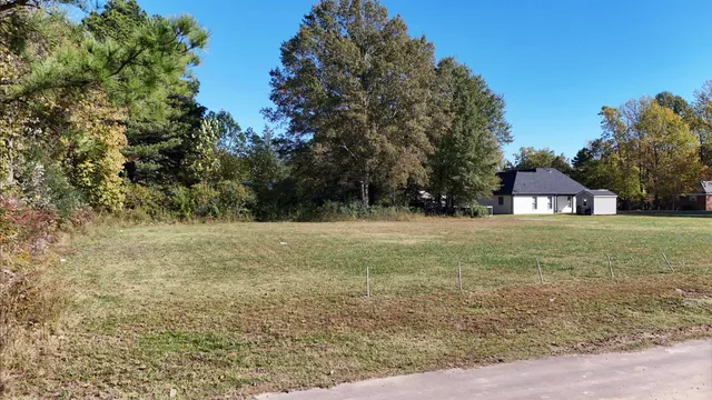a view of under a house with a yard