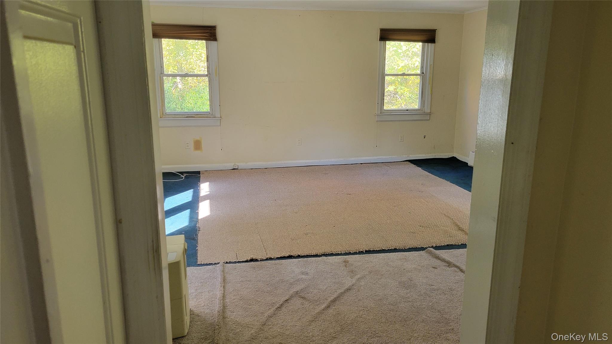 2 Stephens Lane Valhalla, NY 10595 - Photo 5 of 9 a view of an empty room with a window