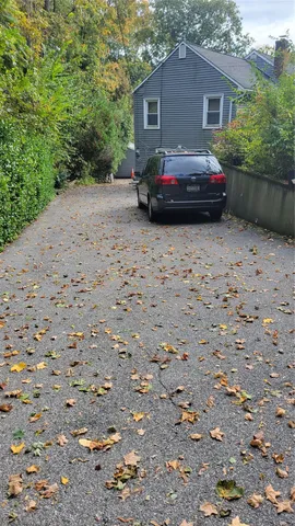 a car parked in front of a house