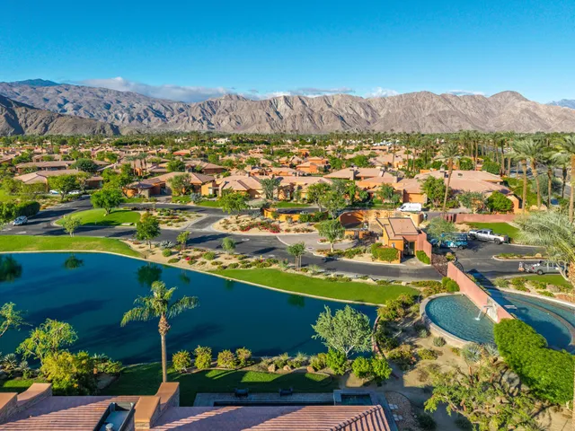 a view of a city with mountains in the background