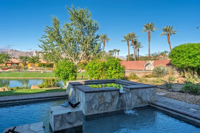 a view of outdoor sitting area with furniture
