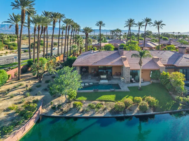 a view of swimming pool with outdoor seating