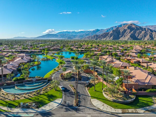 a view of a swimming pool with a table and chairs
