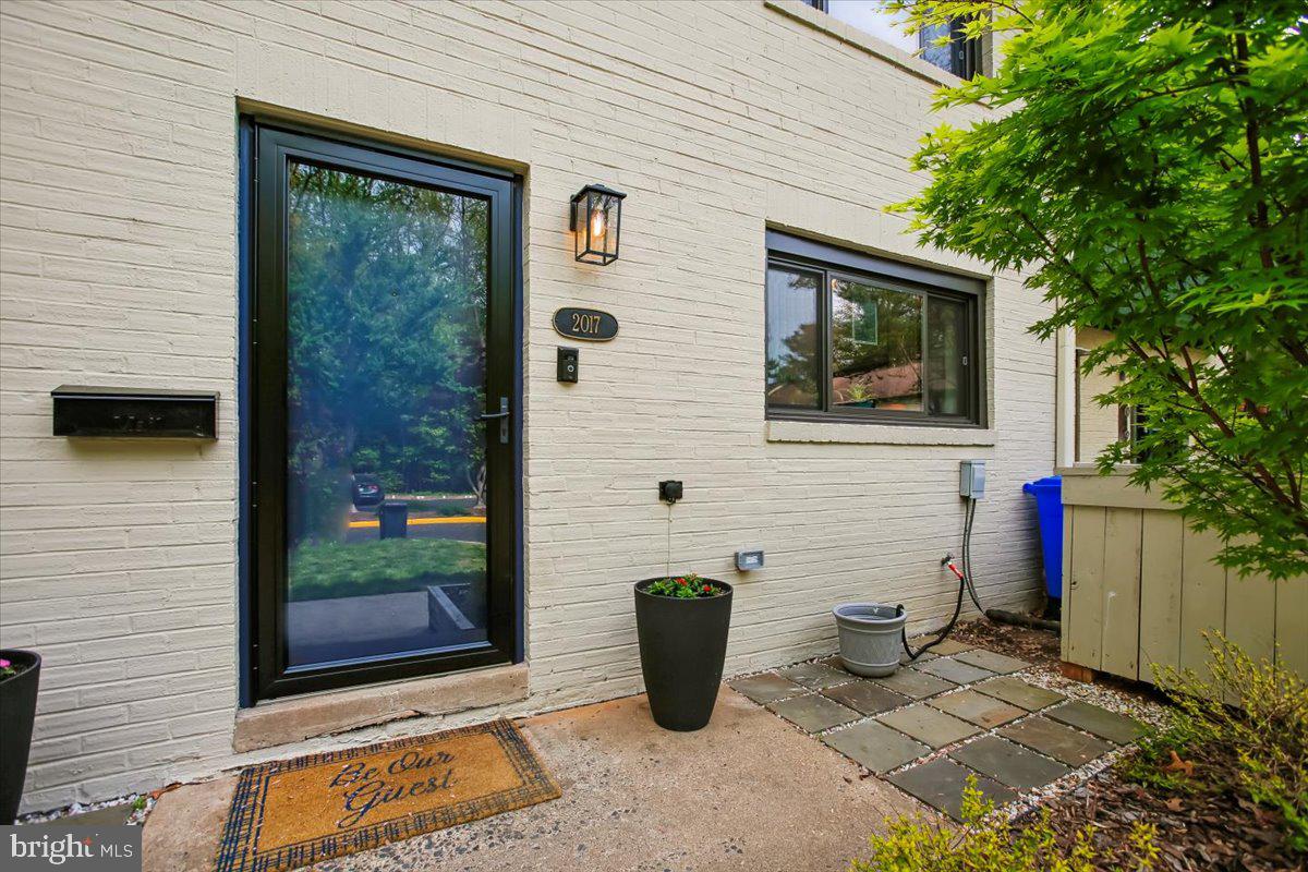 2017 Sarazen Place Reston, VA 20191 - Photo 5 of 52 Trash & recycling conveniently hidden in front.