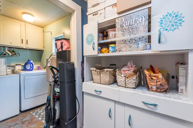 a room with storage and utility room