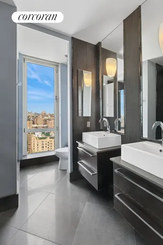 a bed room with a bed and a window