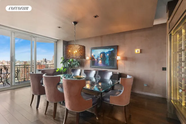 a living room with furniture a rug and a large window