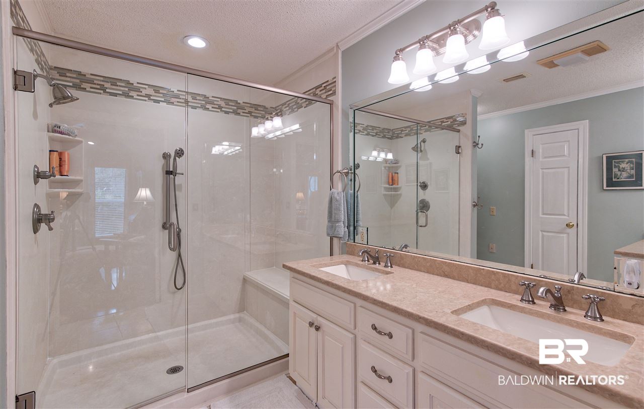 706 Winn Avenue Fairhope, AL 36532 - Photo 18 of 42 Large shower with bench.