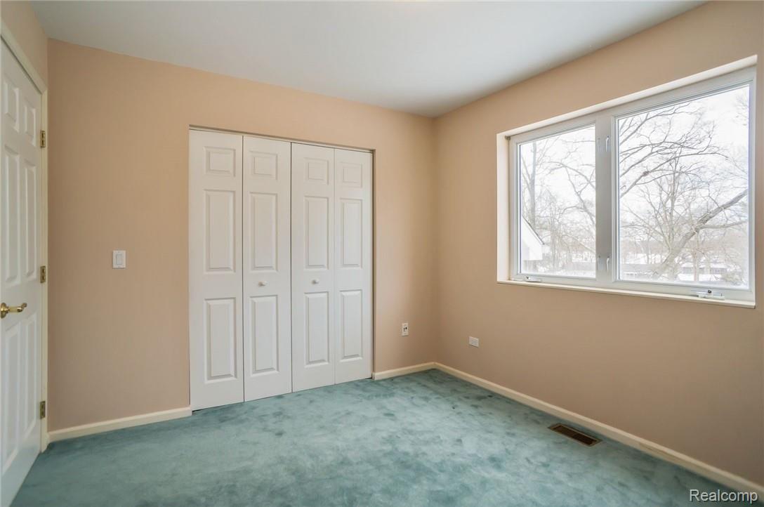 11104 Mcgregor Road Pinckney, MI 48169 - Photo 23 of 42 Upstairs bedroom with lake and canal view.
