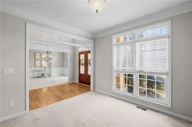 a view of an empty room with a window