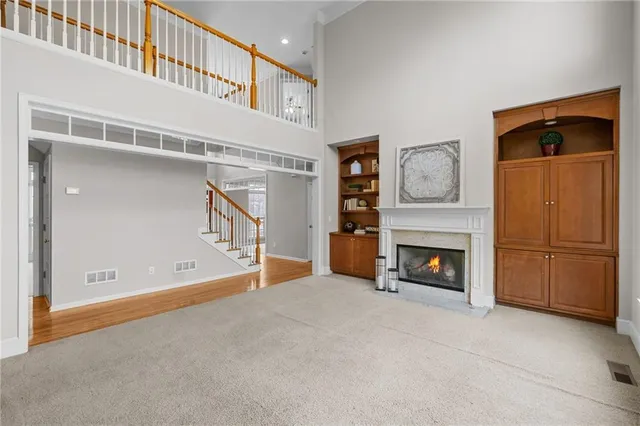 an aerial view of residential house with outdoor space and swimming pool