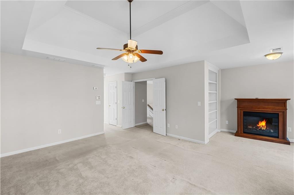 403 Glenhurst Trace Canton, GA 30115 - Photo 33 of 73 a view of an empty room with a fireplace