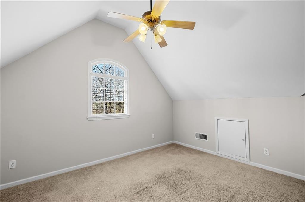 403 Glenhurst Trace Canton, GA 30115 - Photo 38 of 73 an empty room with a window and a fan