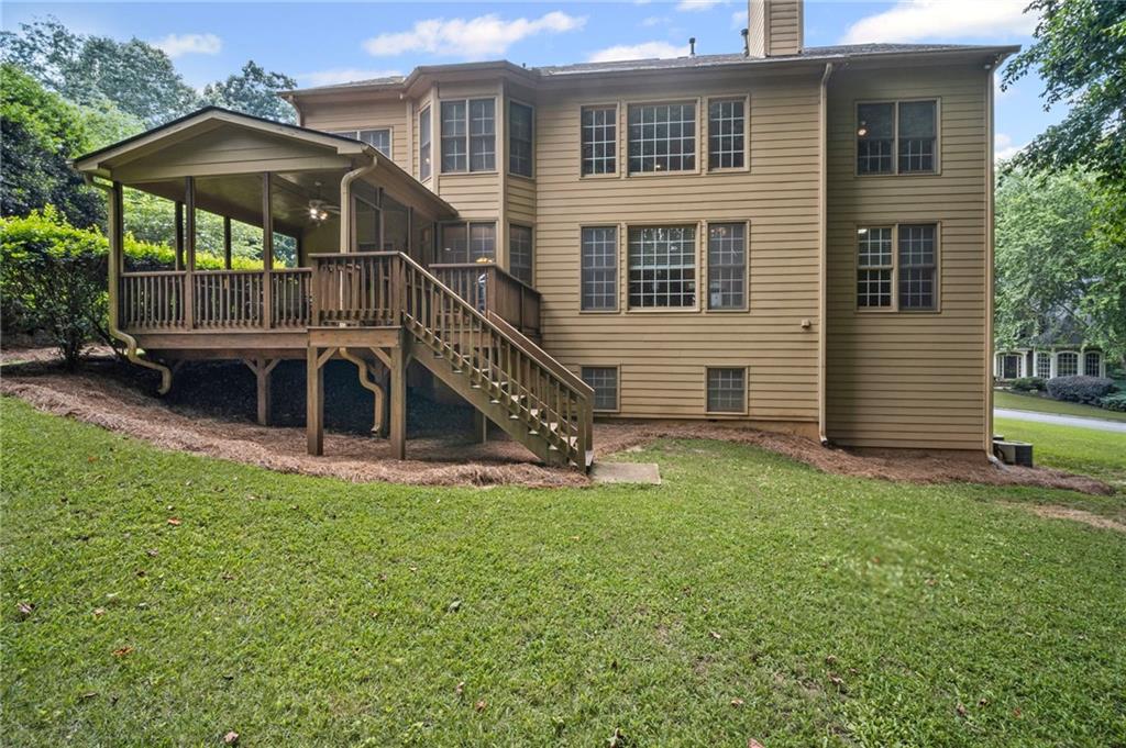 403 Glenhurst Trace Canton, GA 30115 - Photo 61 of 73 a view of a house with a yard