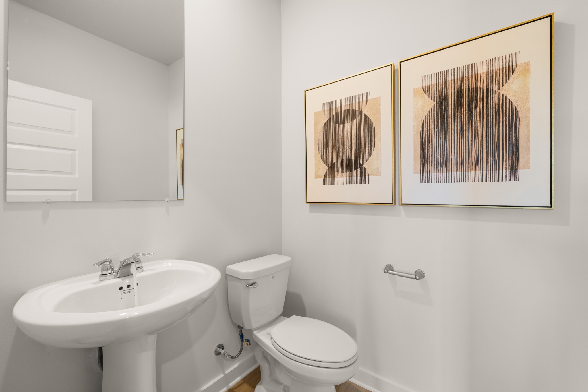 2412 Williams Rdg Drive Columbia, TN 38401 - Photo 22 of 54 a bathroom with a toilet a sink and mirror
