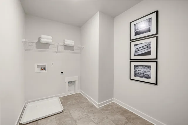 a spacious bedroom with a bed and furniture