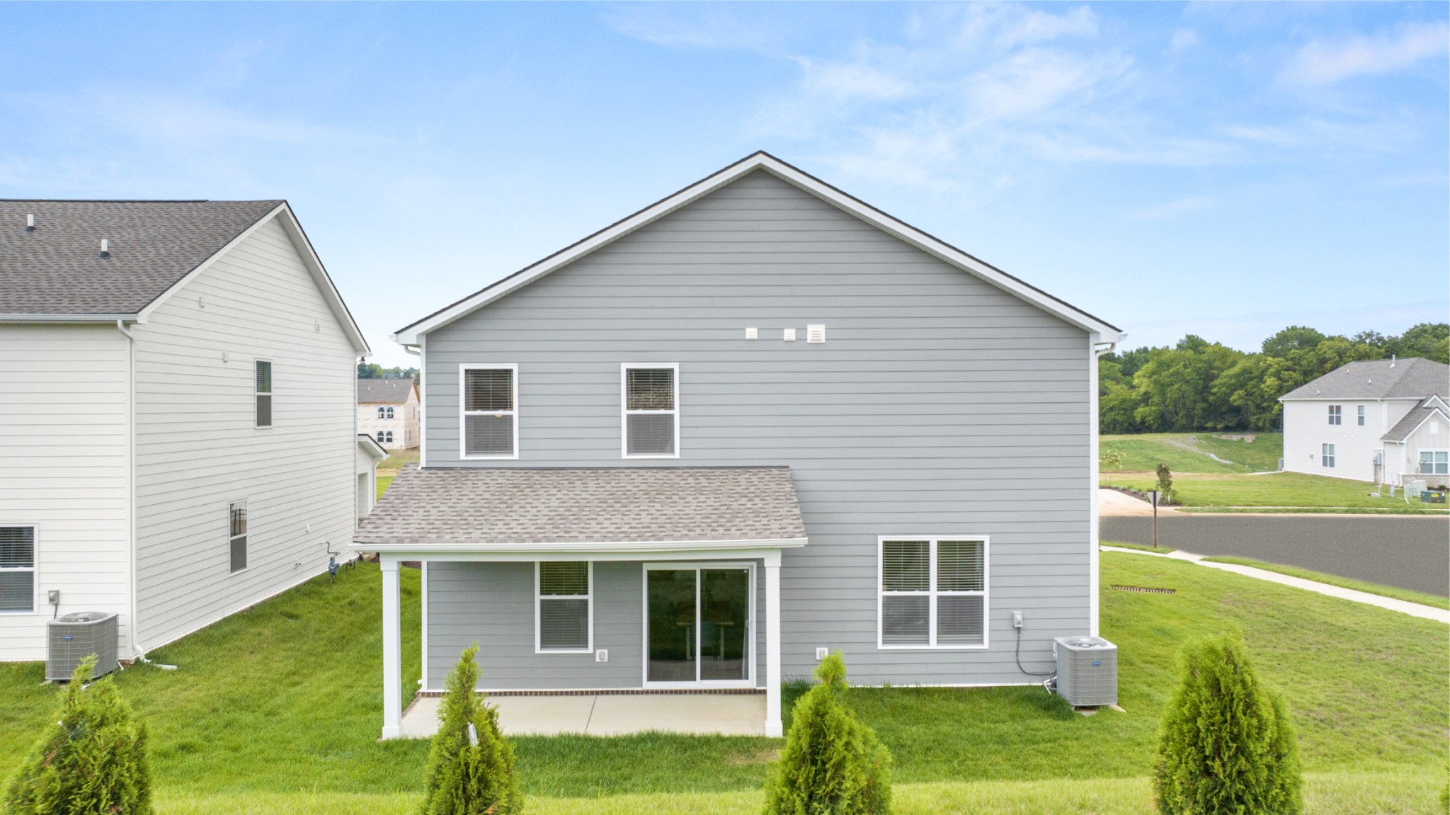 2412 Williams Rdg Drive Columbia, TN 38401 - Photo 4 of 54 a front view of a house with garden