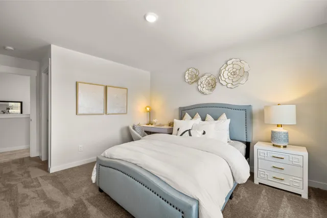 a room with a couch and a mirror