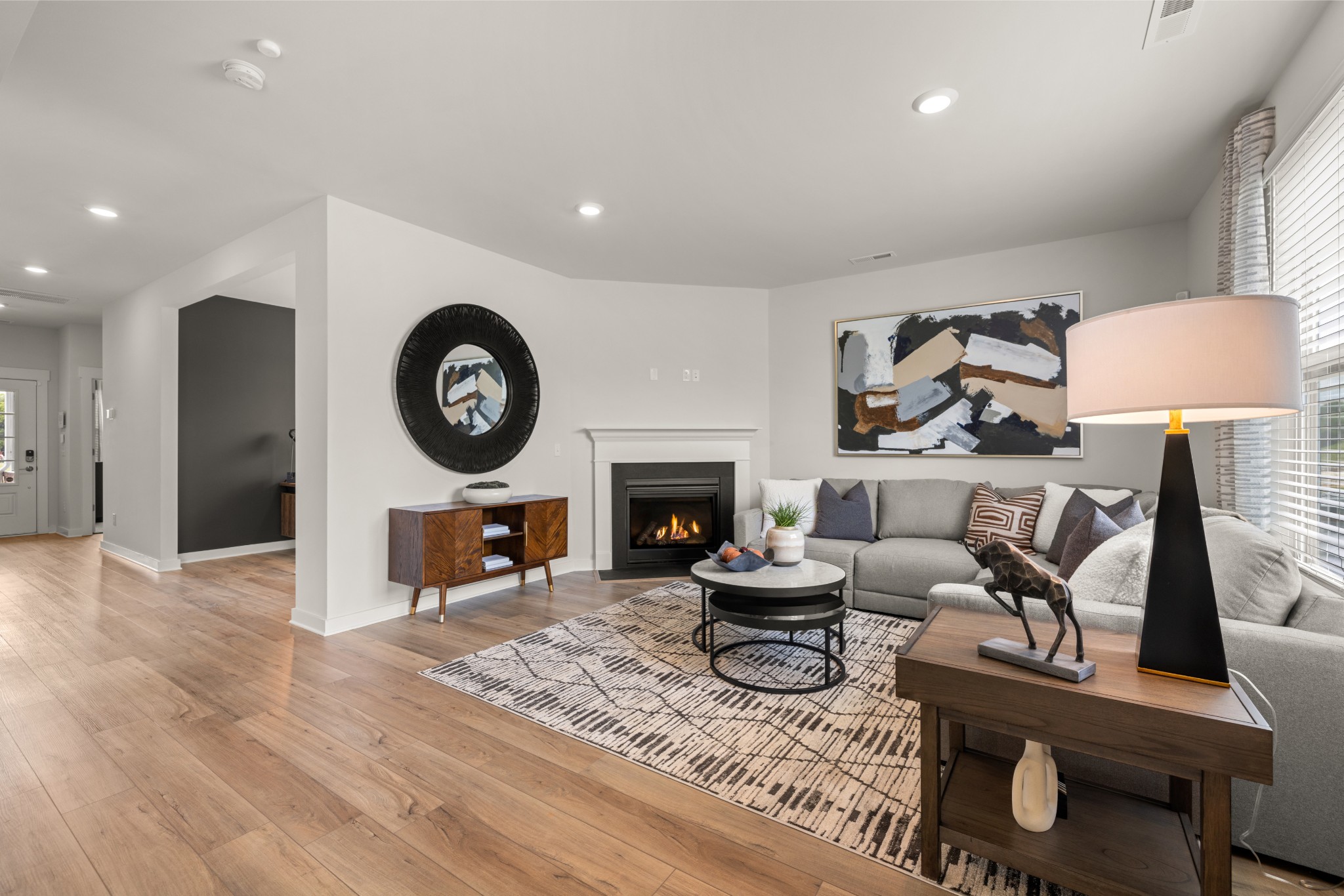 2412 Williams Rdg Drive Columbia, TN 38401 - Photo 7 of 54 a living room with furniture a clock and a fireplace