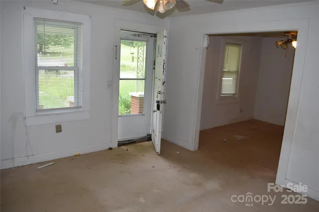 an empty room with windows