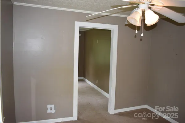 a bathroom with a mirror and a shower