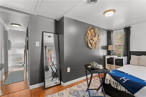 a view of a workspace with furniture and entryway