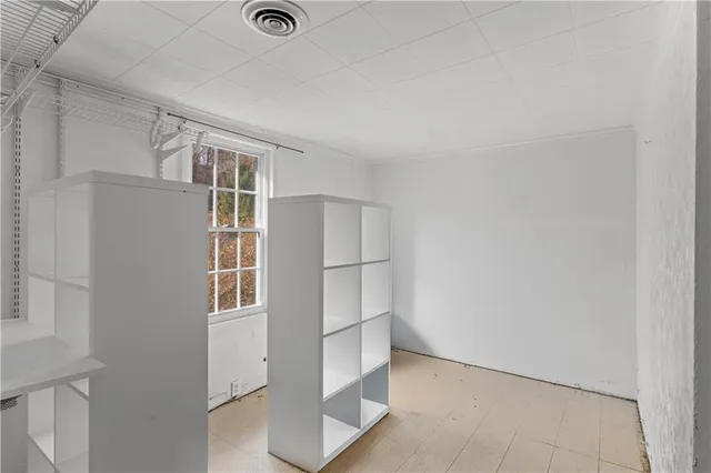 an empty room with windows