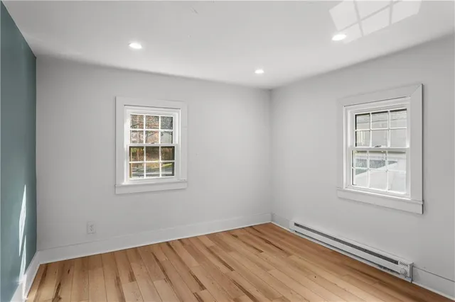 an empty room with windows