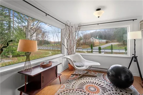 a living room with couch and a table