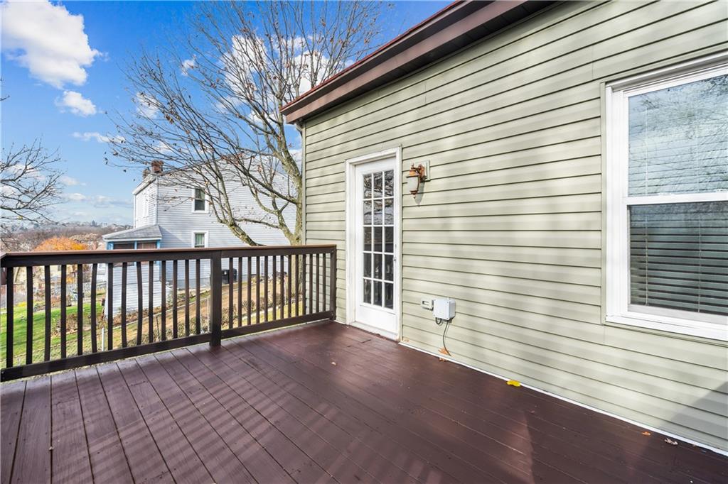 2918 Spring Street Pittsburgh, PA 15210 - Photo 17 of 25 a view of a porch with a bench