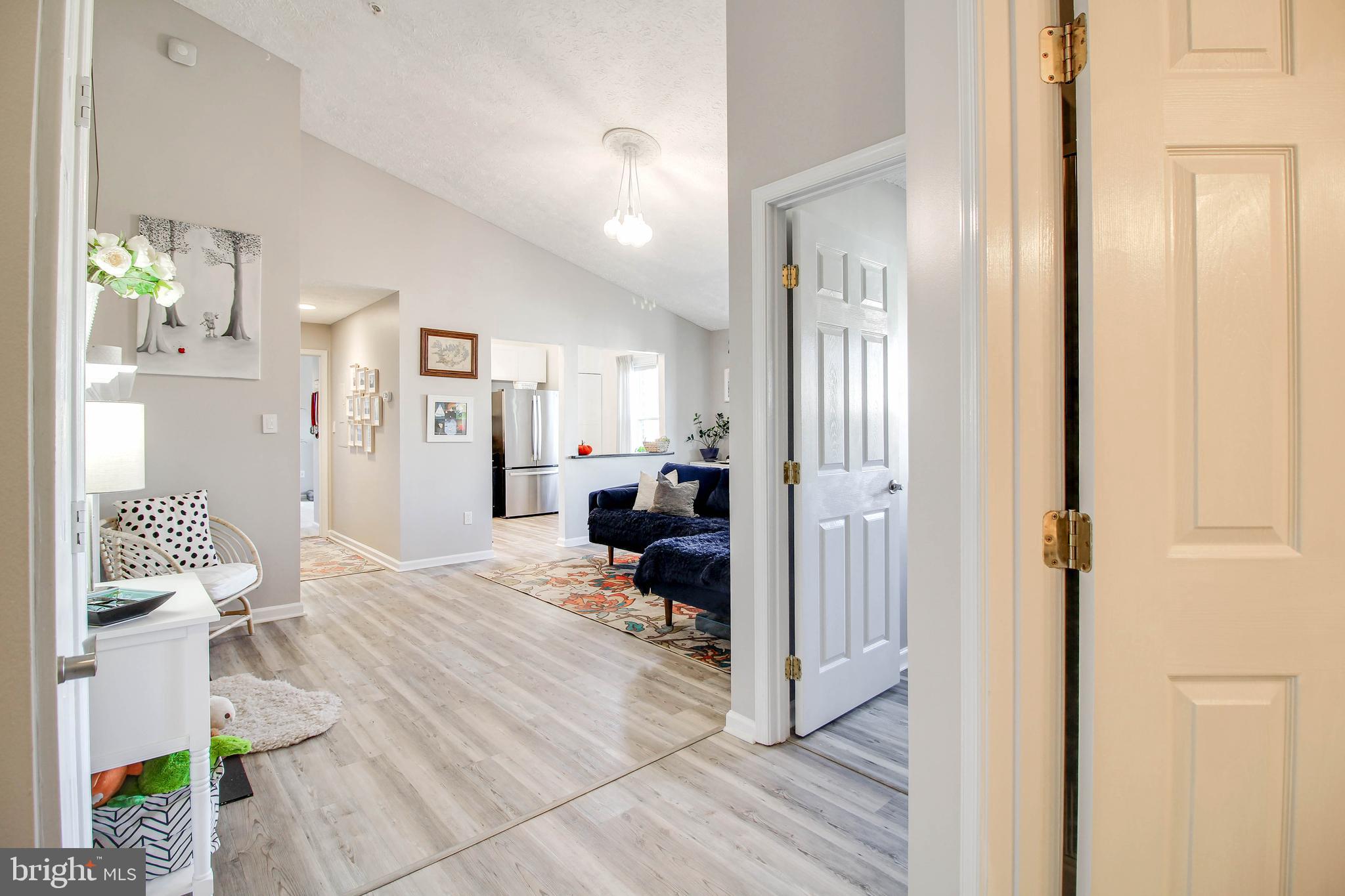 2445 Blue Spring Court, Unit 304 Odenton, MD 21113 - Photo 2 of 50 Vaulted ceilings greet you as you walk in