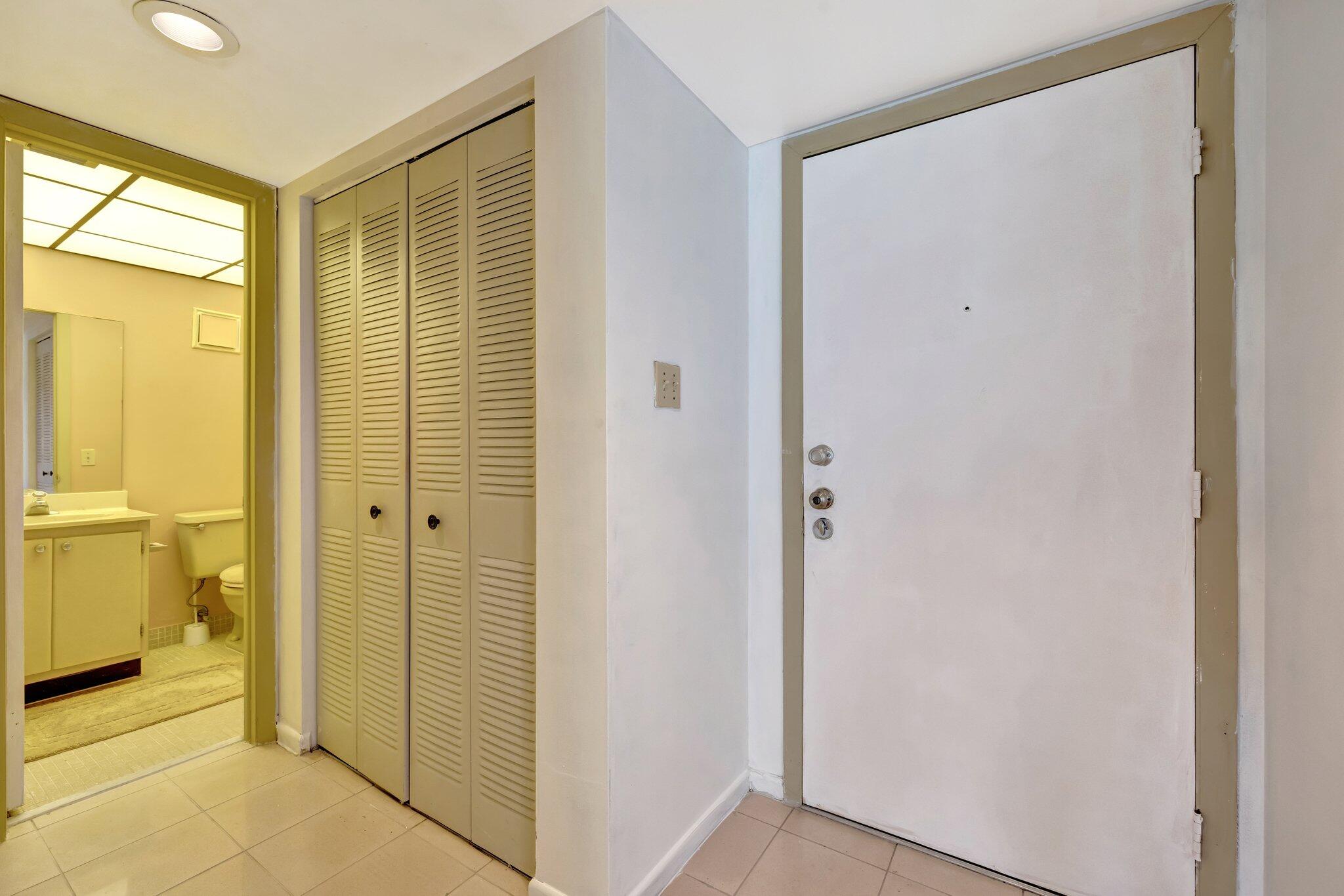 3301 Northwest 47th Terrace, Unit 410 Lauderdale Lakes, FL 33319 - Photo 19 of 58 a view of bathroom with a shower and a toilet