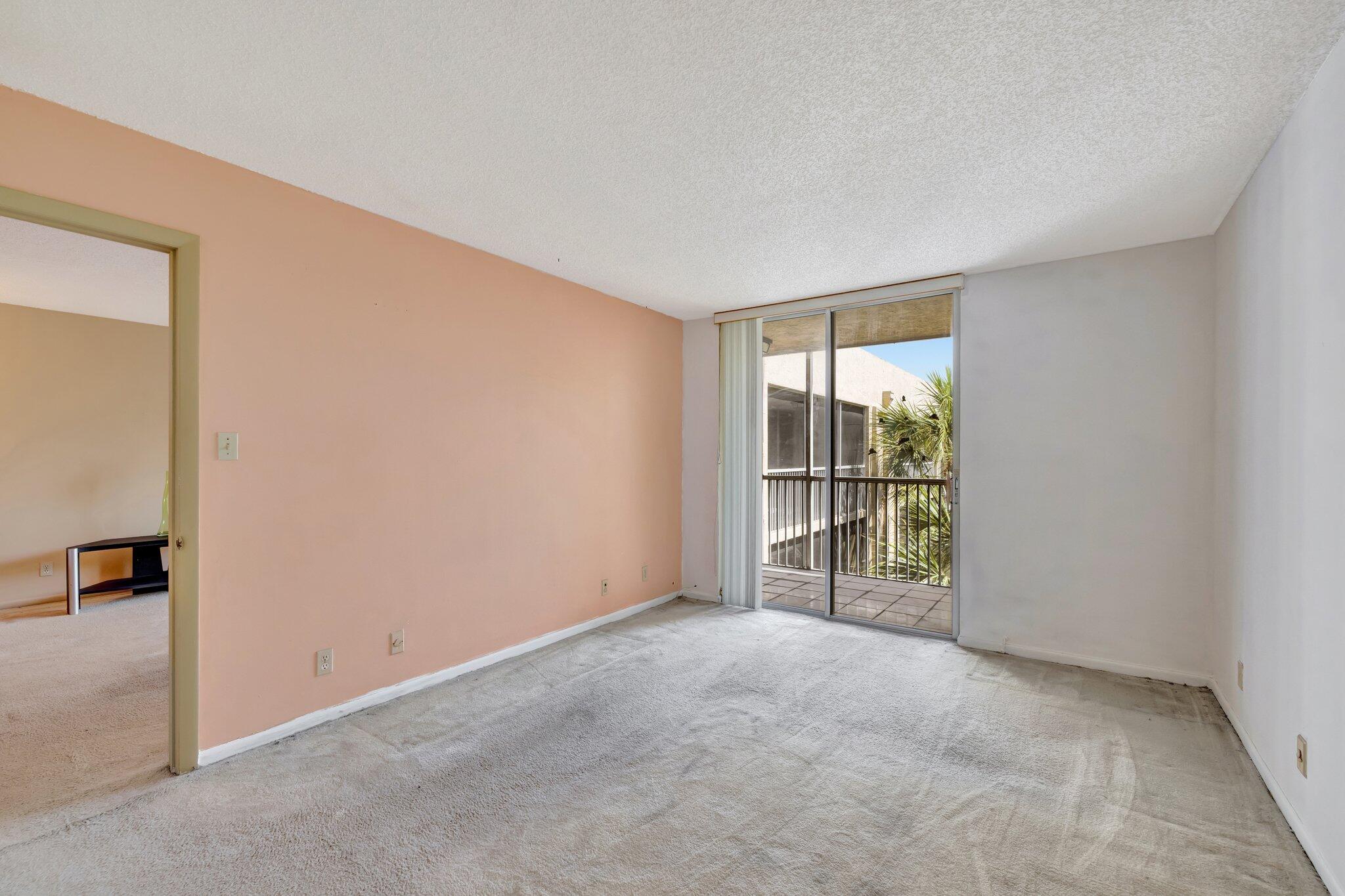 3301 Northwest 47th Terrace, Unit 410 Lauderdale Lakes, FL 33319 - Photo 22 of 58 a view of an empty room with a window