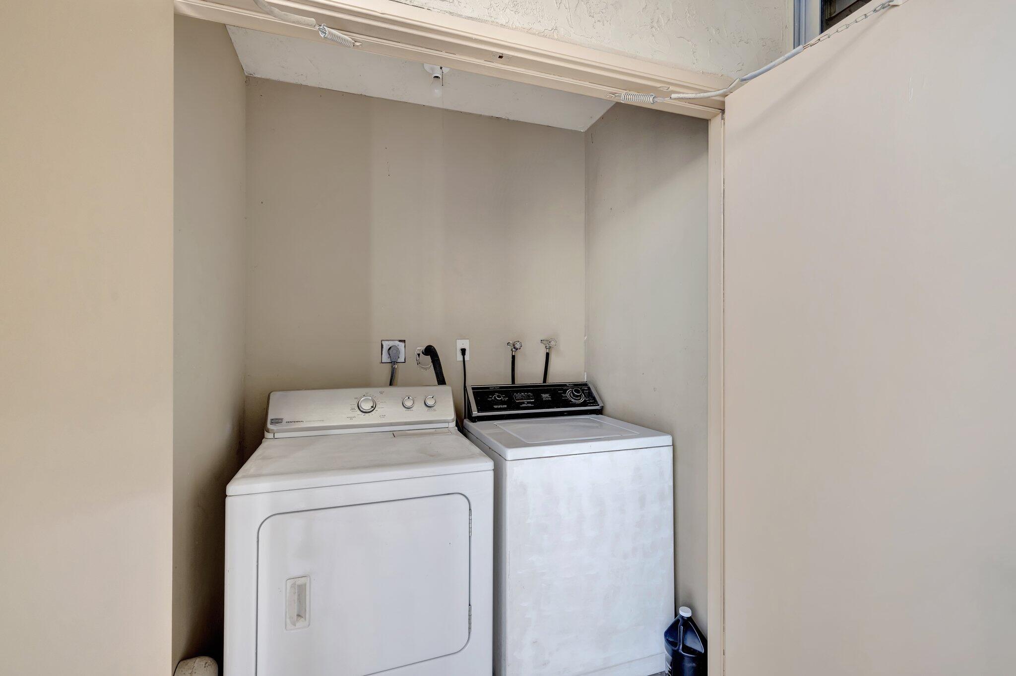 3301 Northwest 47th Terrace, Unit 410 Lauderdale Lakes, FL 33319 - Photo 29 of 58 a utility room with dryer and washer